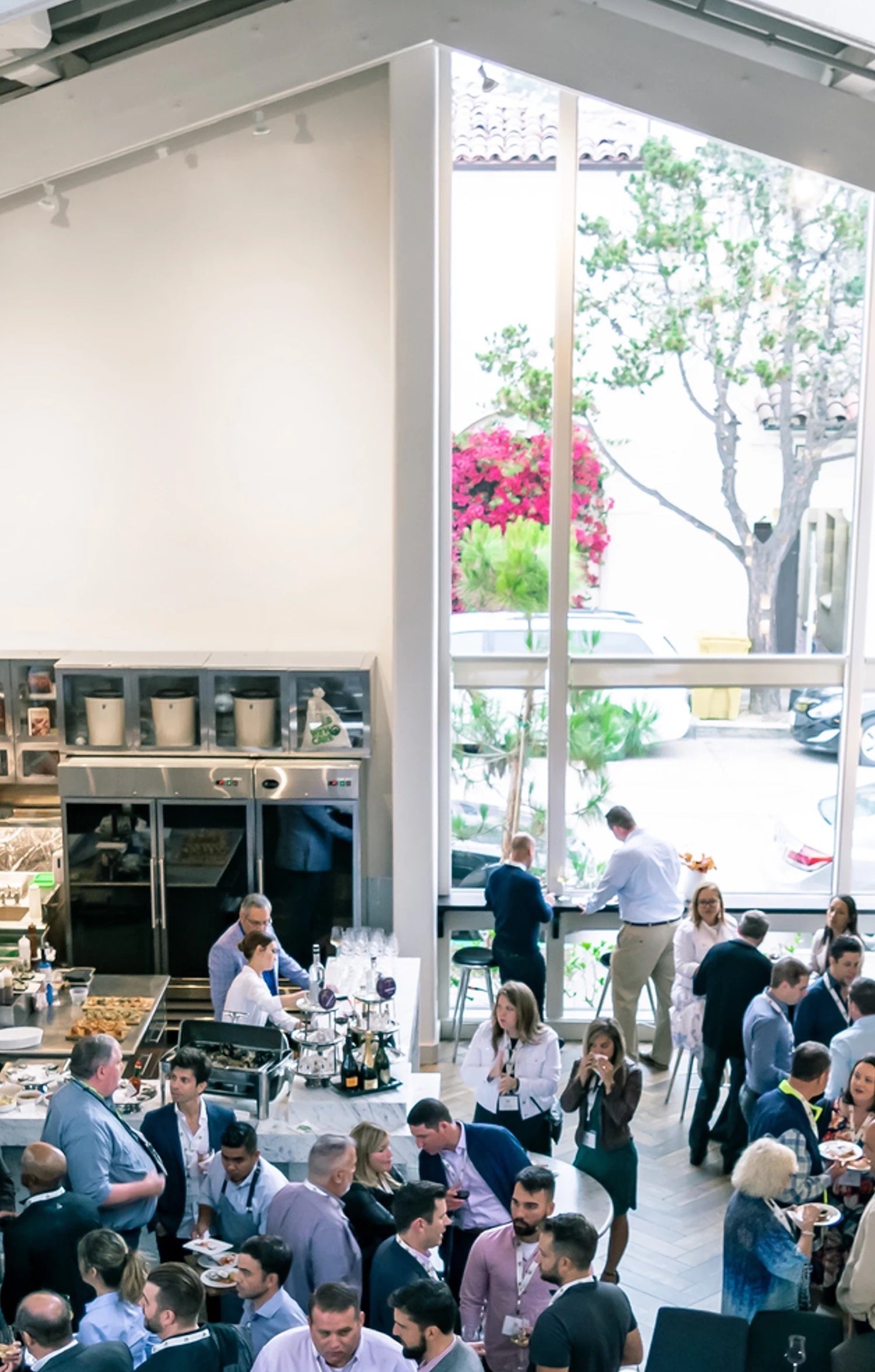 Corporate mixer event inside of large dining room of Seventh and Dolores restaurant